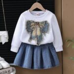 Cross-border new product: two-piece set for girls, including a spring and autumn denim bow tie sweater and a heavy-duty washed denim skirt